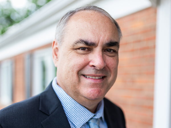 Dr. Thomas Piazza smiling outside Streitz Dental Arts