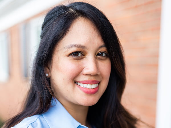 Dr. Kristine Streitz smiling outside Streitz Dental Arts